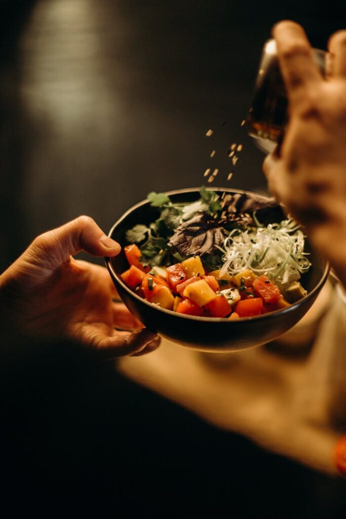 A delicious bowl of Asian salad with fresh vegetables and sesame seeds, perfect for a healthy meal.